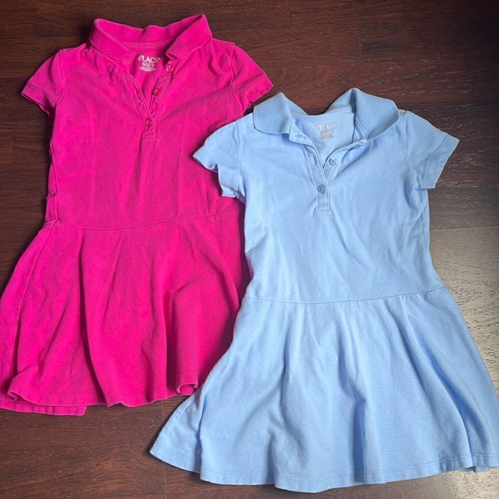 A pair of uniform dresses